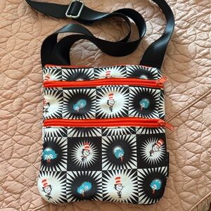 Black and White Crossbody Bag with Red Accents